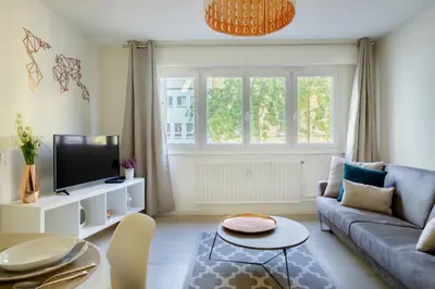Télévision ou salle de divertissement dans l'établissement Le Belpierre