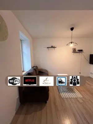 Télévision ou salle de divertissement dans l'établissement Le 1 - Très beau T3 Neuf rez-de-chaussée centre ville - stationnement gratuit