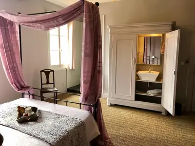 Un ou plusieurs lits dans un hébergement de l'établissement B&B La Clé d'Alsace