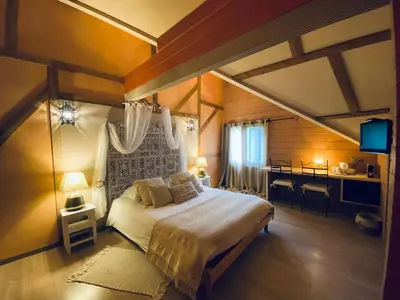 Un ou plusieurs lits dans un hébergement de l'établissement Le Chalet d'Etienne