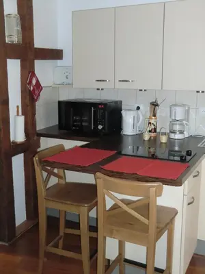 Cuisine ou kitchenette dans l'établissement Gite Muscat