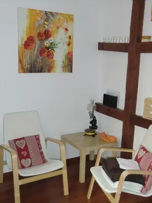 Coin salon dans l'établissement Gite Muscat