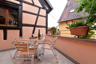 Balcon ou terrasse dans l'établissement B&B Le Clos des Raisins
