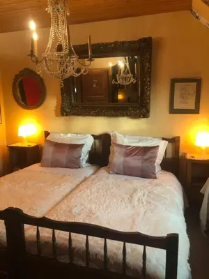 Un ou plusieurs lits dans un hébergement de l'établissement La Maison de juliette