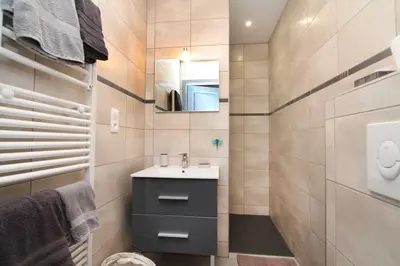 Salle de bains dans l'établissement Gite-les-myrtilles