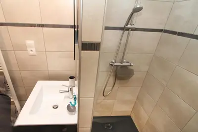 Salle de bains dans l'établissement Gite-les-myrtilles