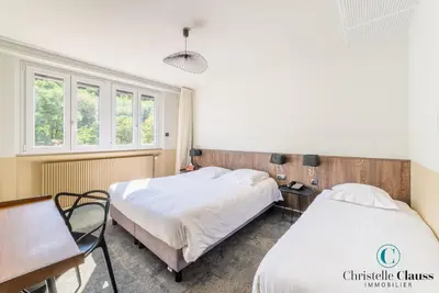 Un ou plusieurs lits dans un hébergement de l'établissement Hotel Restaurant au Floridor