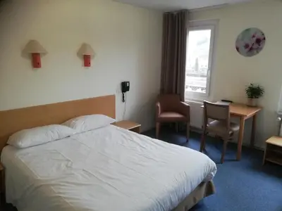 Un ou plusieurs lits dans un hébergement de l'établissement Hôtel Restaurant Le Moschenross