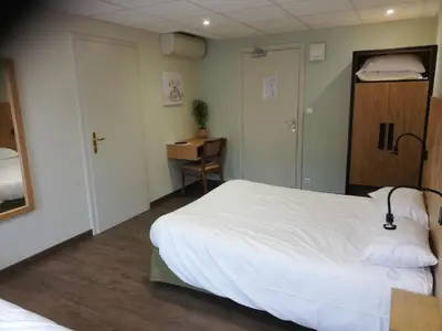 Un ou plusieurs lits dans un hébergement de l'établissement Hôtel Restaurant Le Moschenross
