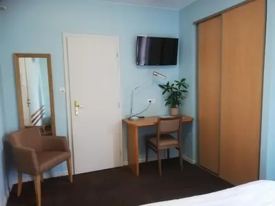 Télévision ou salle de divertissement dans l'établissement Hôtel Restaurant Le Moschenross