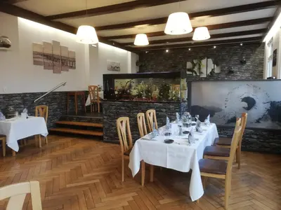 Restaurant ou autre lieu de restauration dans l'établissement Hôtel Restaurant Le Moschenross