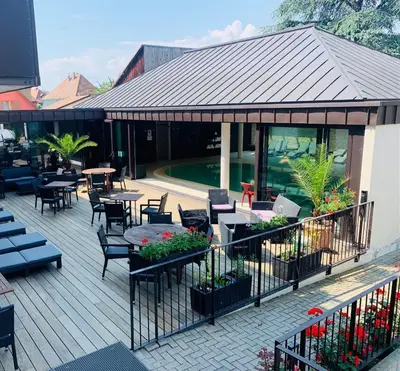 Restaurant ou autre lieu de restauration dans l'établissement Résidence Les Cigogneaux