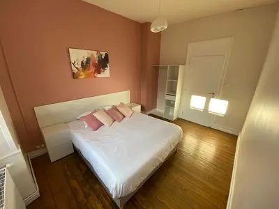 Un ou plusieurs lits dans un hébergement de l'établissement Hotel-Restaurant St-Christophe