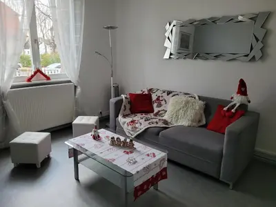 Coin salon dans l'établissement Appartement T3 très calme - Le Bartholdi - Centre de Colmar