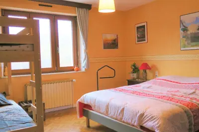 Un ou plusieurs lits dans un hébergement de l'établissement Gîte de famille dans les Vosges