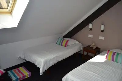 Un ou plusieurs lits dans un hébergement de l'établissement Hôtel le Saint Nicolas