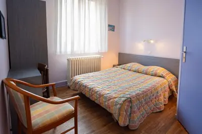 Un ou plusieurs lits dans un hébergement de l'établissement Hôtel du Ladhof