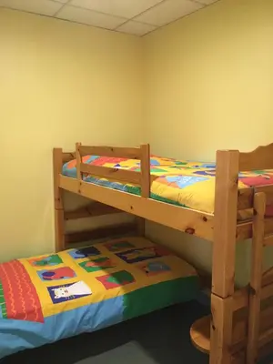 Un ou plusieurs lits dans un hébergement de l'établissement Hostellerie d'Alsace