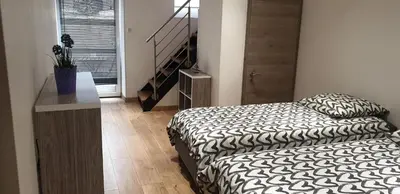 Un ou plusieurs lits dans un hébergement de l'établissement JAB'S HOME