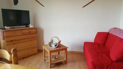 Télévision ou salle de divertissement dans l'établissement résidence vallée des lacs