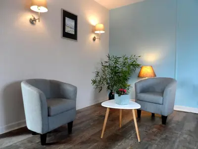 Coin salon dans l'établissement Maison Curiale