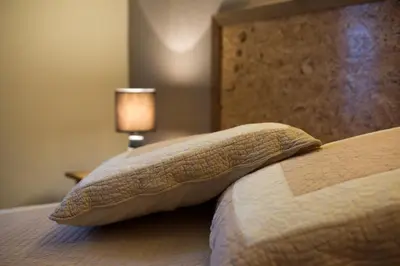 Un ou plusieurs lits dans un hébergement de l'établissement Hôtel Restaurant Beysang