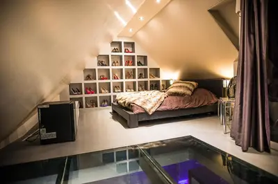 Un ou plusieurs lits dans un hébergement de l'établissement Loft Spa Cathedrale