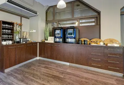 Cuisine ou kitchenette dans l'établissement B&B HOTEL Montbéliard-Sochaux