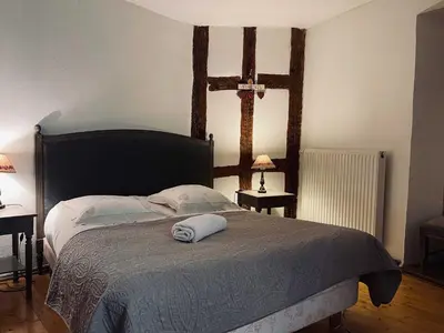 Un ou plusieurs lits dans un hébergement de l'établissement Gîte Le Chemin de Ronde