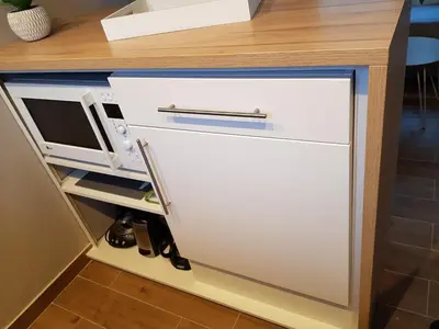 Cuisine ou kitchenette dans l'établissement Gite Delphine