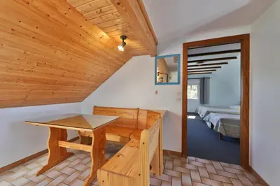 Un ou plusieurs lits dans un hébergement de l'établissement Gîte à La Montagne