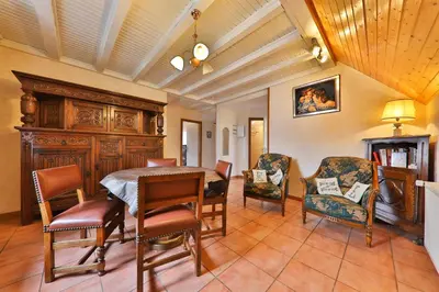 Coin salon dans l'établissement Gîte à La Montagne