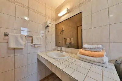 Salle de bains dans l'établissement Gîte à La Montagne