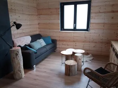 Coin salon dans l'établissement Chalet du Toit Vosgien