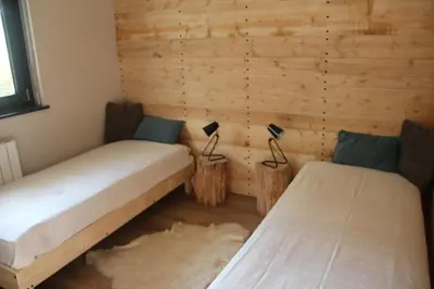 Un ou plusieurs lits dans un hébergement de l'établissement Chalet du Toit Vosgien