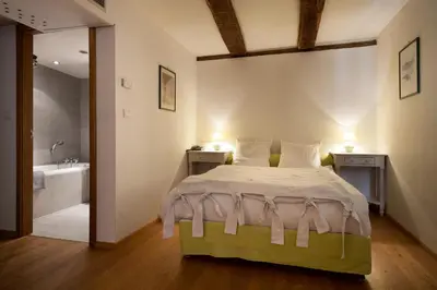 Un ou plusieurs lits dans un hébergement de l'établissement Auberge Saint Laurent