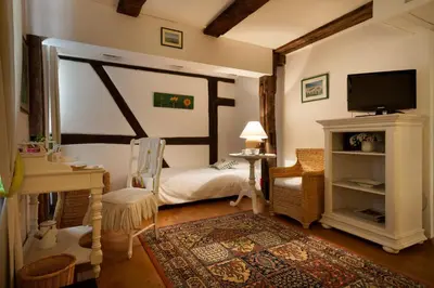 Un ou plusieurs lits dans un hébergement de l'établissement Auberge Saint Laurent