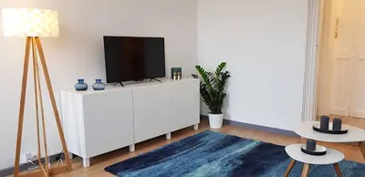 Télévision ou salle de divertissement dans l'établissement Le Bas Rebberg - Face Gare