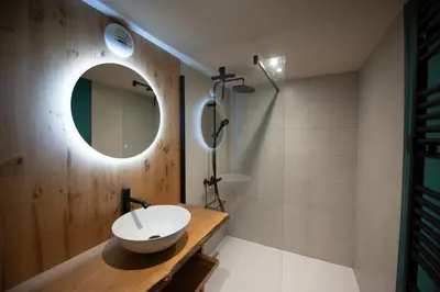 Salle de bains dans l'établissement Chalet des sorbiers