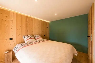Un ou plusieurs lits dans un hébergement de l'établissement Chalet des sorbiers