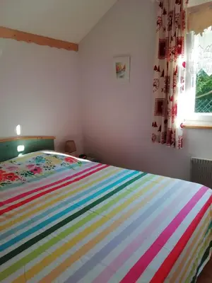 Un ou plusieurs lits dans un hébergement de l'établissement Le Chalet Bel Air