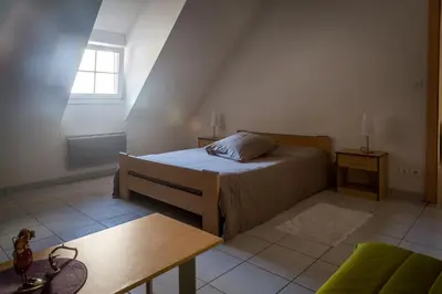 Un ou plusieurs lits dans un hébergement de l'établissement Gîtes & Chambes d'Hôtes Fugler