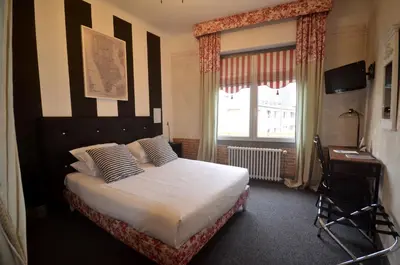 Télévision ou salle de divertissement dans l'établissement Hôtel Vauban