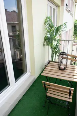 Balcon ou terrasse dans l'établissement MAMA with mobile aircon, including free parking space at 300 meters