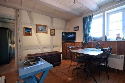Télévision ou salle de divertissement dans l'établissement Gite Chez Marianne