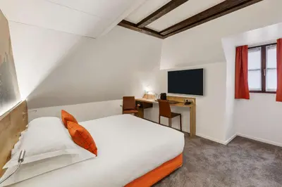 Télévision ou salle de divertissement dans l'établissement Hotel KLE, BW Signature Collection