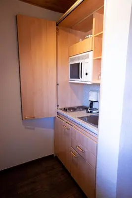 Cuisine ou kitchenette dans l'établissement Azureva Club Bussang