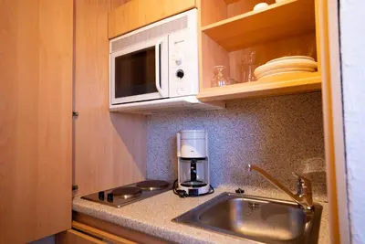 Cuisine ou kitchenette dans l'établissement Azureva Club Bussang