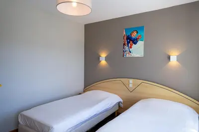 Un ou plusieurs lits dans un hébergement de l'établissement Azureva Club Bussang