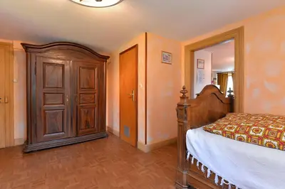 Un ou plusieurs lits dans un hébergement de l'établissement Gites ou Chambres d'hôtes à la ferme